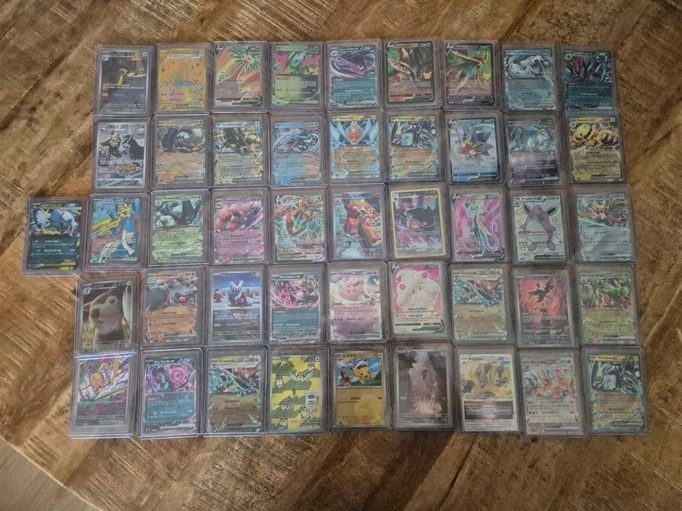 49 Pokémon kaarten met koffer, Ophalen of Verzenden