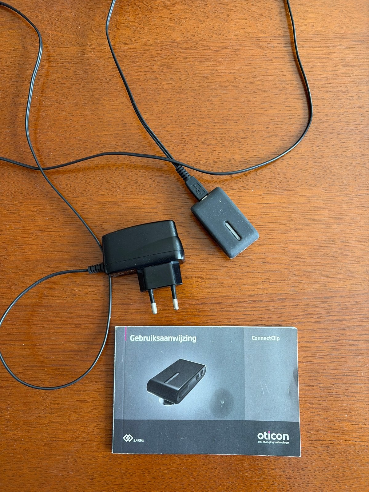 Oticon ConnectClip met oplader en handleiding, Ophalen of Verzenden, Zo goed als nieuw