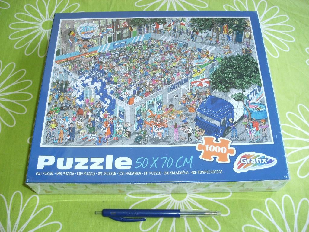 Nieuw in seal: Jubileum puzzel Action - 2000 winkels 1000 st, Hobby en Vrije tijd, Denksport en Puzzels, Ophalen of Verzenden
