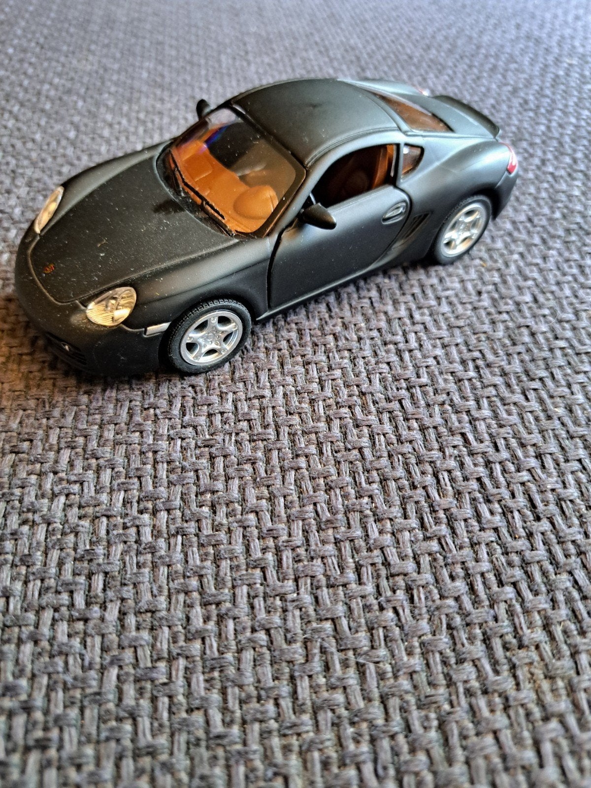 Kinsmart model porsche cayman s schaal 1:34, Gebruikt, Auto, Ophalen of Verzenden, N.b