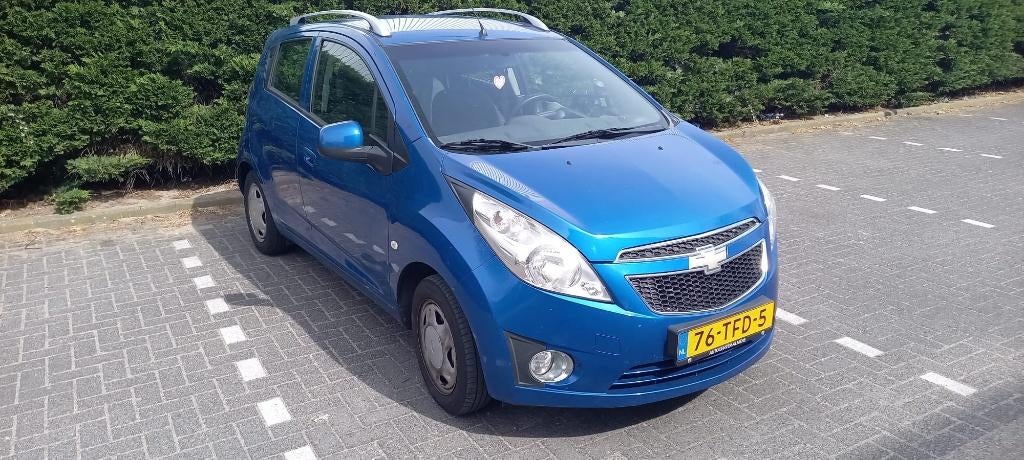 Chevrolet Spark 1.0 Bifuel 2012 Blauw, Auto's, 37 €/maand, 4 cilinders, Blauw, Origineel Nederlands