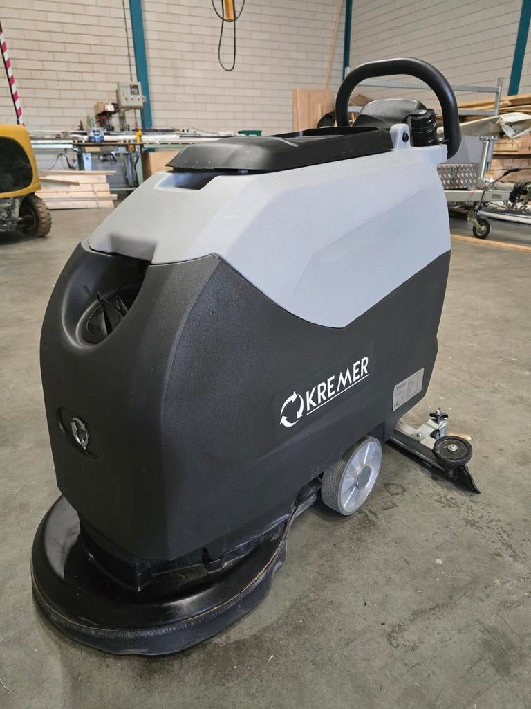 Kremer Schrobzuigmachine, Ophalen