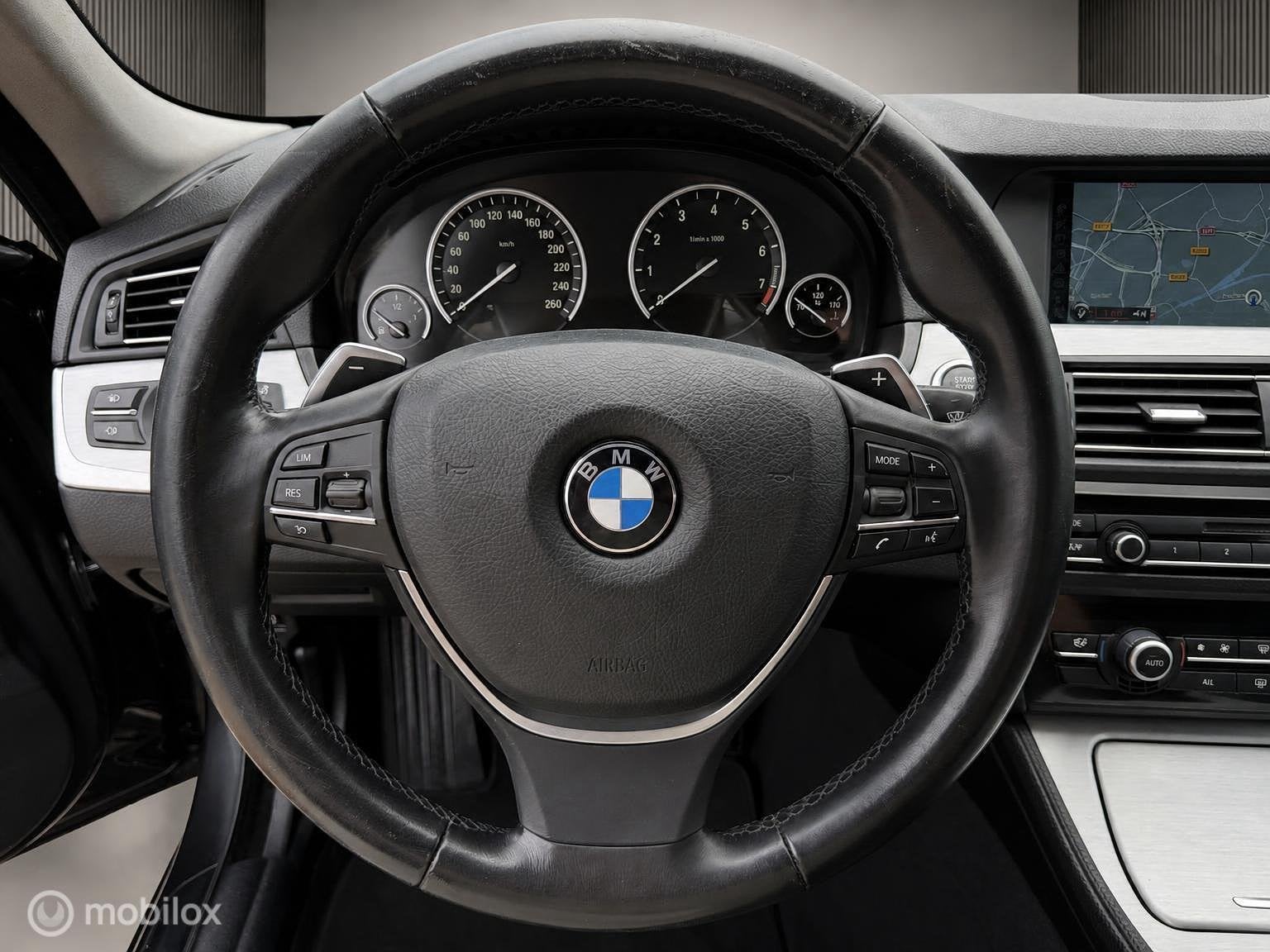 Foto 9 van BMW 5-serie Touring 520i High Executive