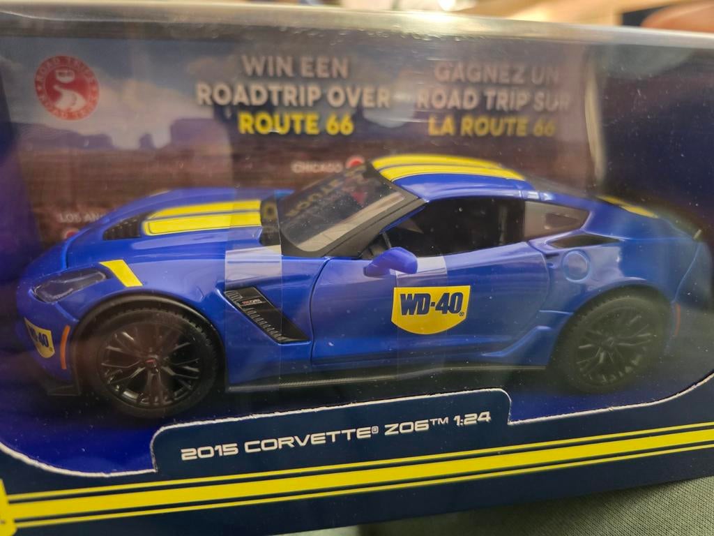 WD-40 2015 Corvette Z06 1:24 modelauto, Ophalen of Verzenden, Nieuw, Auto, Maisto