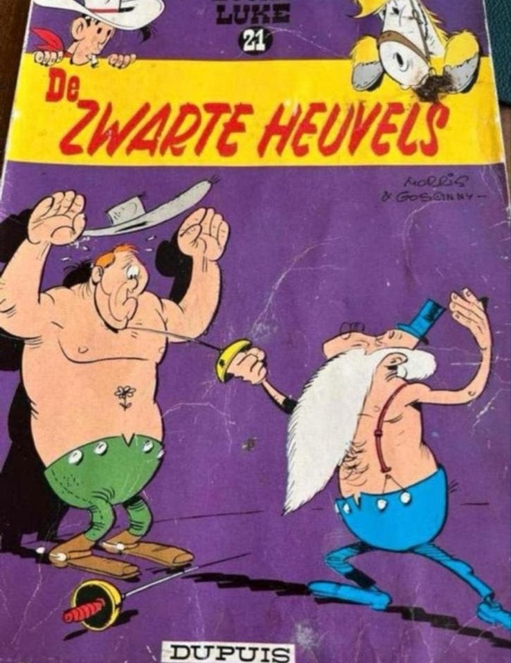 Lucky Luke 21: De Zwarte Heuvels - Dupuis, Eén stripboek, Ophalen of Verzenden, Gelezen