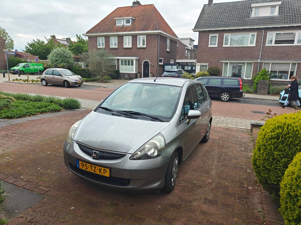 HONDA JAZZ automaat clima 1,4 LS, Auto's, Honda, 4 cilinders, Grijs, 1102 kg, Jazz