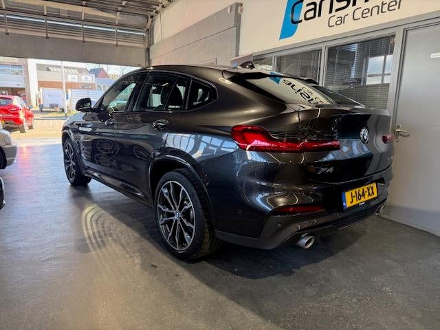 BMW X4 XDrive20i M High Executive Edition Pano|Head-UP|Carpl, Automaat, 1998 cc, 15 km/l, Gebruikt