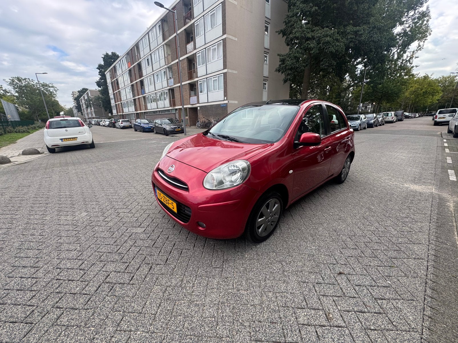 Nissan Micra 1.2 72KW 5DR 2012 Rood, Auto's, Voorwielaandrijving, 40 €/maand, 1198 cc, 23 km/l