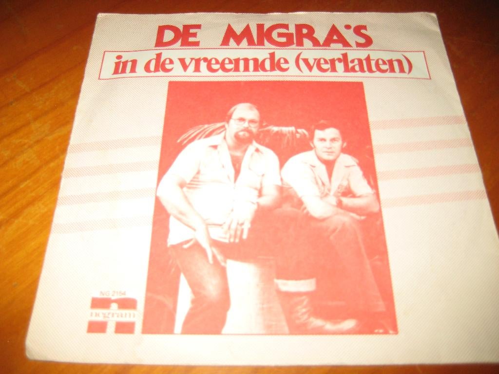 De Migra`s: In de vreemde (verlaten), Ophalen of Verzenden, Zo goed als nieuw, Nederlandstalig