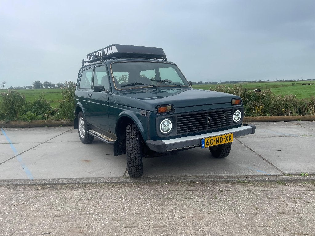 Lada Niva 1.7 I 4WD 2003 Blauw, Auto's, Stof, Niva, Zwart, Origineel Nederlands