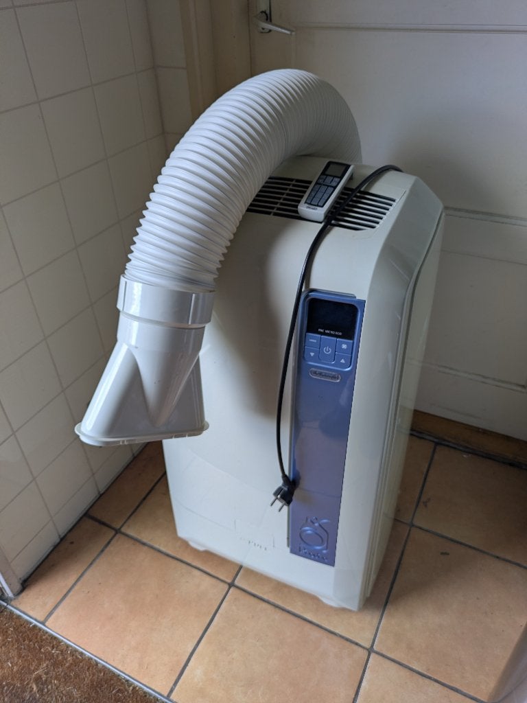 Mobiele airco Delonghi Pinguino PAC WE110ECO, Witgoed en Apparatuur, Airco's, Ophalen, Gebruikt, 3 snelheden of meer, 100 m³ of groter