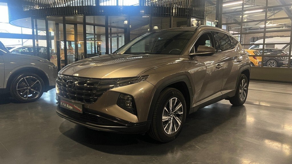 Hyundai TUCSON 1.6 T-GDI Hybride 1650 Kg trekhaak gewicht 23, Auto's, Automaat, Gebruikt, Huisgarantie, 4 cilinders