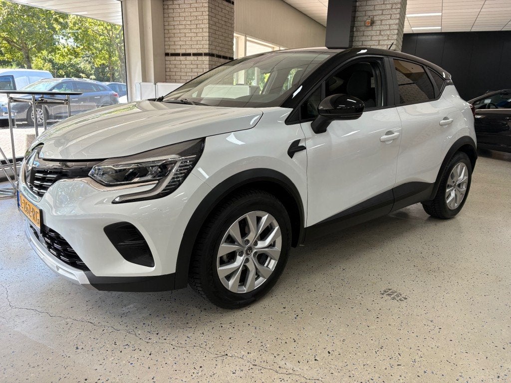 Renault CAPTUR 1.0 TCE Navigatie Airco Multimedia PDC Trekha, Auto's, Voorwielaandrijving, Gebruikt, Met garantie (alle), Wit