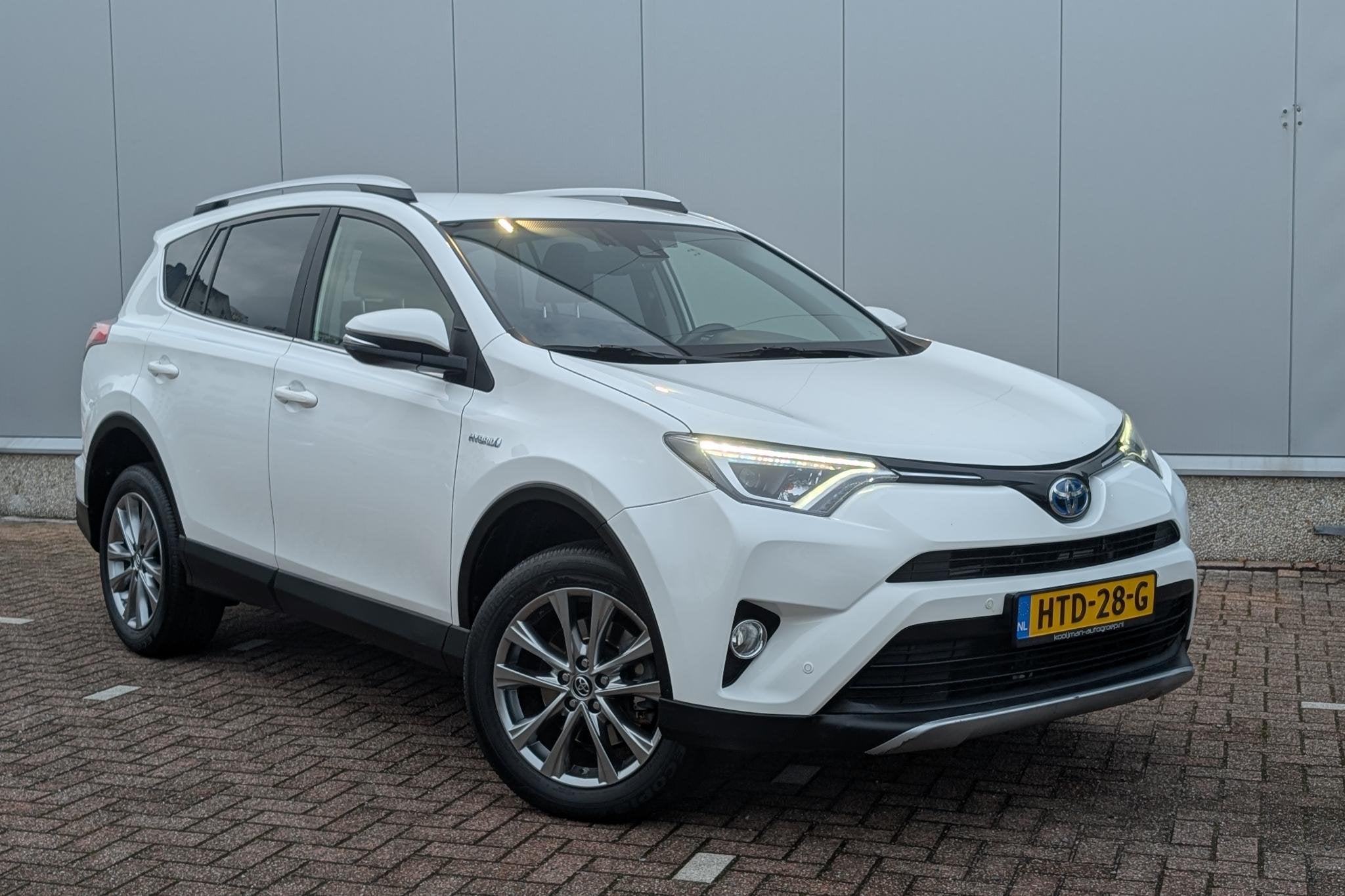 Toyota RAV4 2.5 Hybrid Executive / LMV/ Lederen bekleding/ E, Auto's, Gebruikt, Euro 6, Wit, Bedrijf