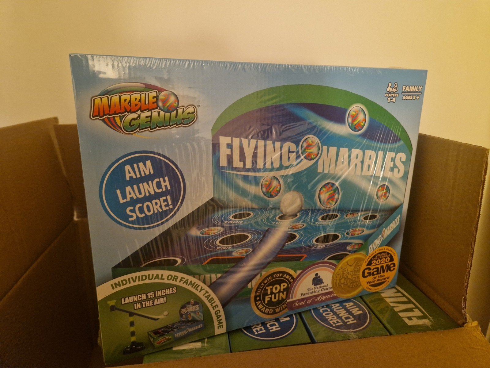 Nieuw partij  knikkerspel: Marble Genius Flying Marbles, Ophalen