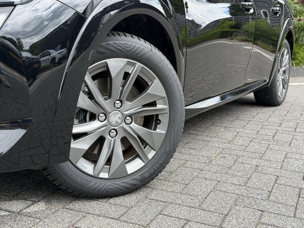 Peugeot e-208 Allure 50 kWh 136PK Automaat Parkeersensoren A, Auto's, 12 maanden, 136 pk, Gebruikt, Leder en Stof