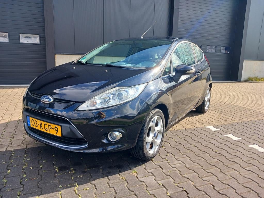 Ford Fiesta Titanium 1.25 3drs, nw APK/LMV/Airco/....., Auto's, Voorwielaandrijving, Stof, Zwart, Handgeschakeld
