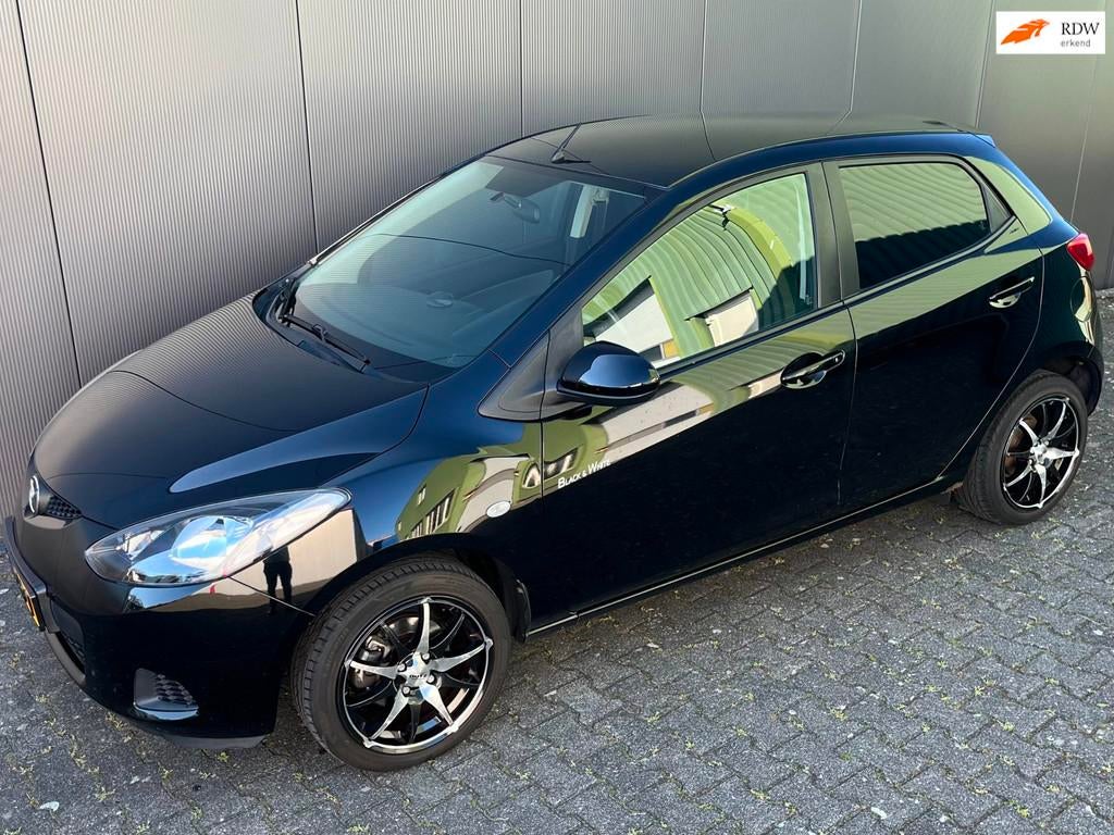 Mazda 2 1.3 XS 72300km als nieuw, Auto's, Voorwielaandrijving, Gebruikt, 4 cilinders, 4 stoelen