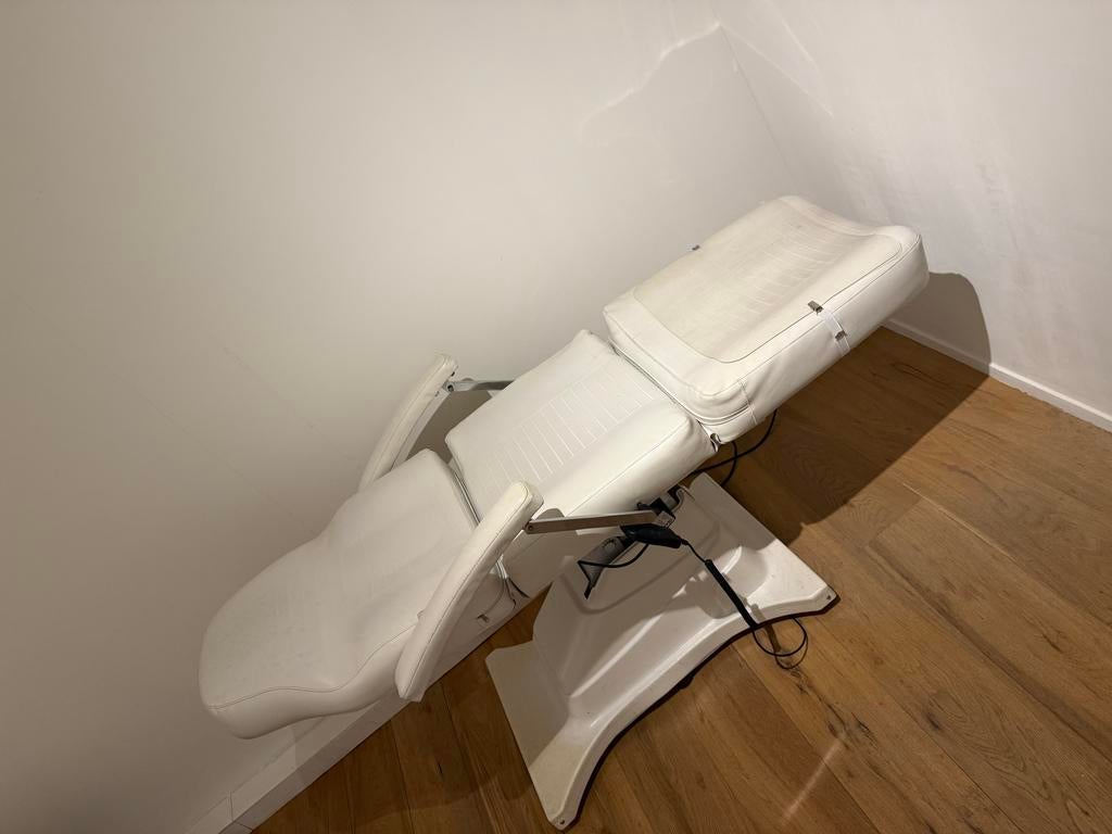 Elektrische behandelstoel, Ophalen, Massagetafel