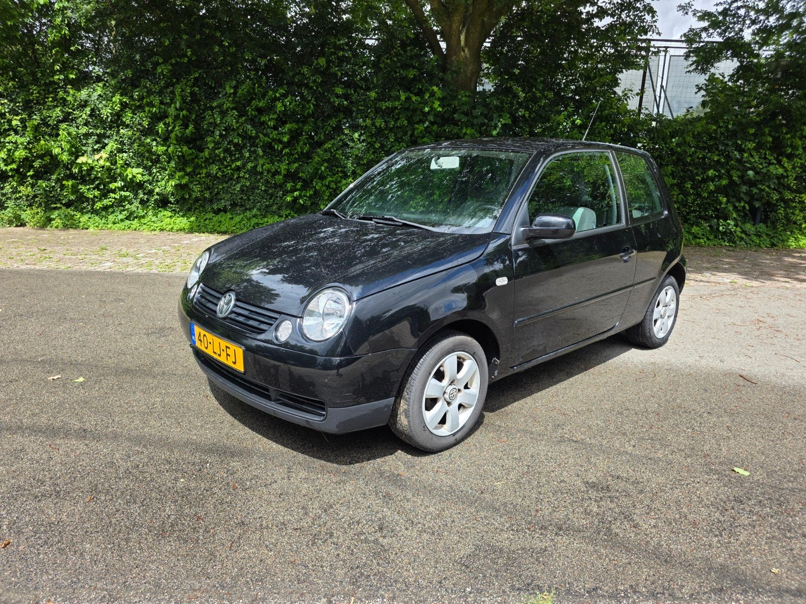 Volkswagen Lupo 1.4 44KW 2003 Zwart, Voorwielaandrijving, 450 kg, 31 €/maand, 4 cilinders