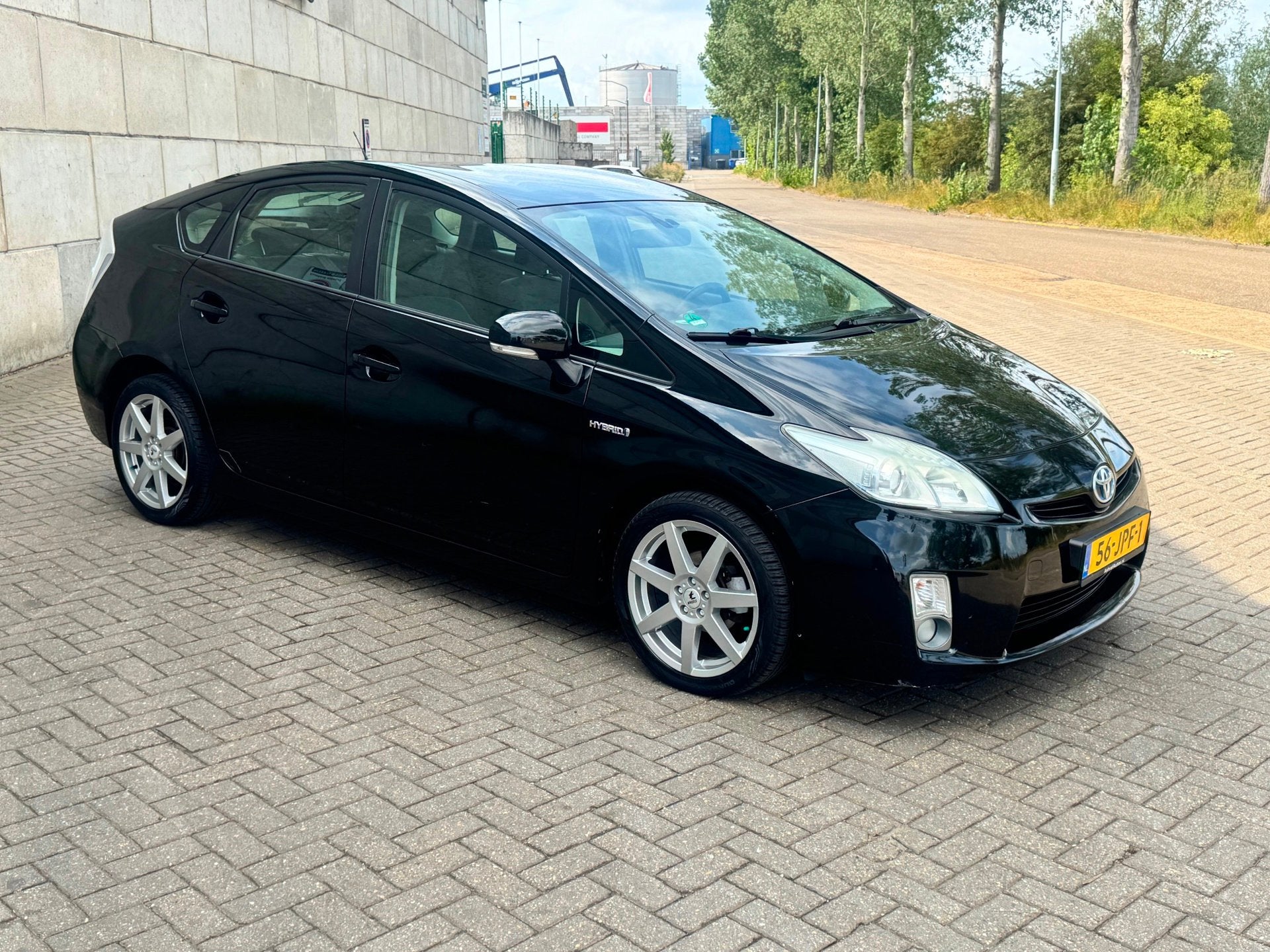 Toyota Prius 1.8 Aspiration, Auto's, Stof, Gebruikt, 4 cilinders, Zwart