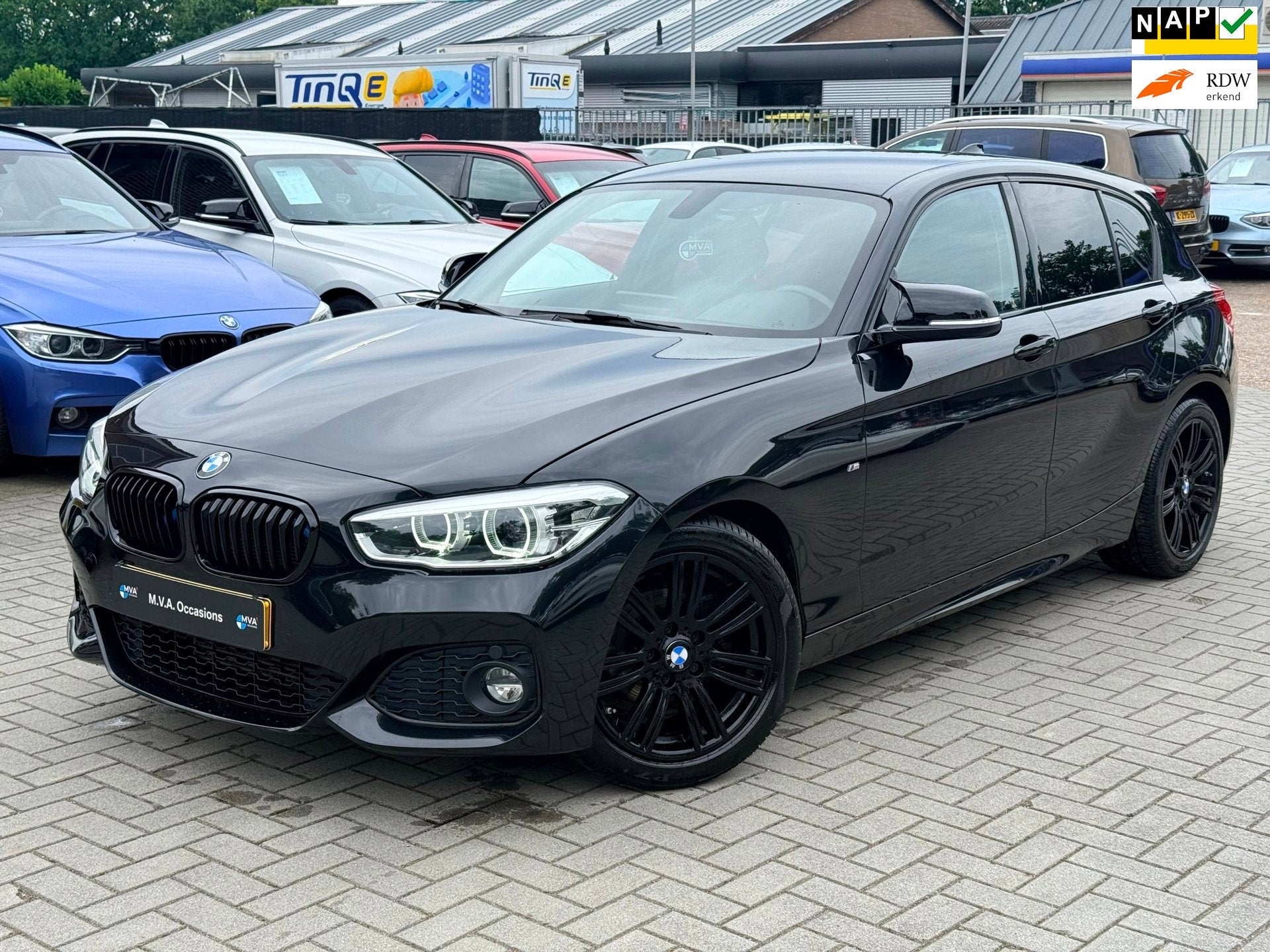 BMW 1-serie 118i Centennial High Executive M Sport|Nieuwe Tu, Gebruikt, Zwart, Bedrijf, 650 kg