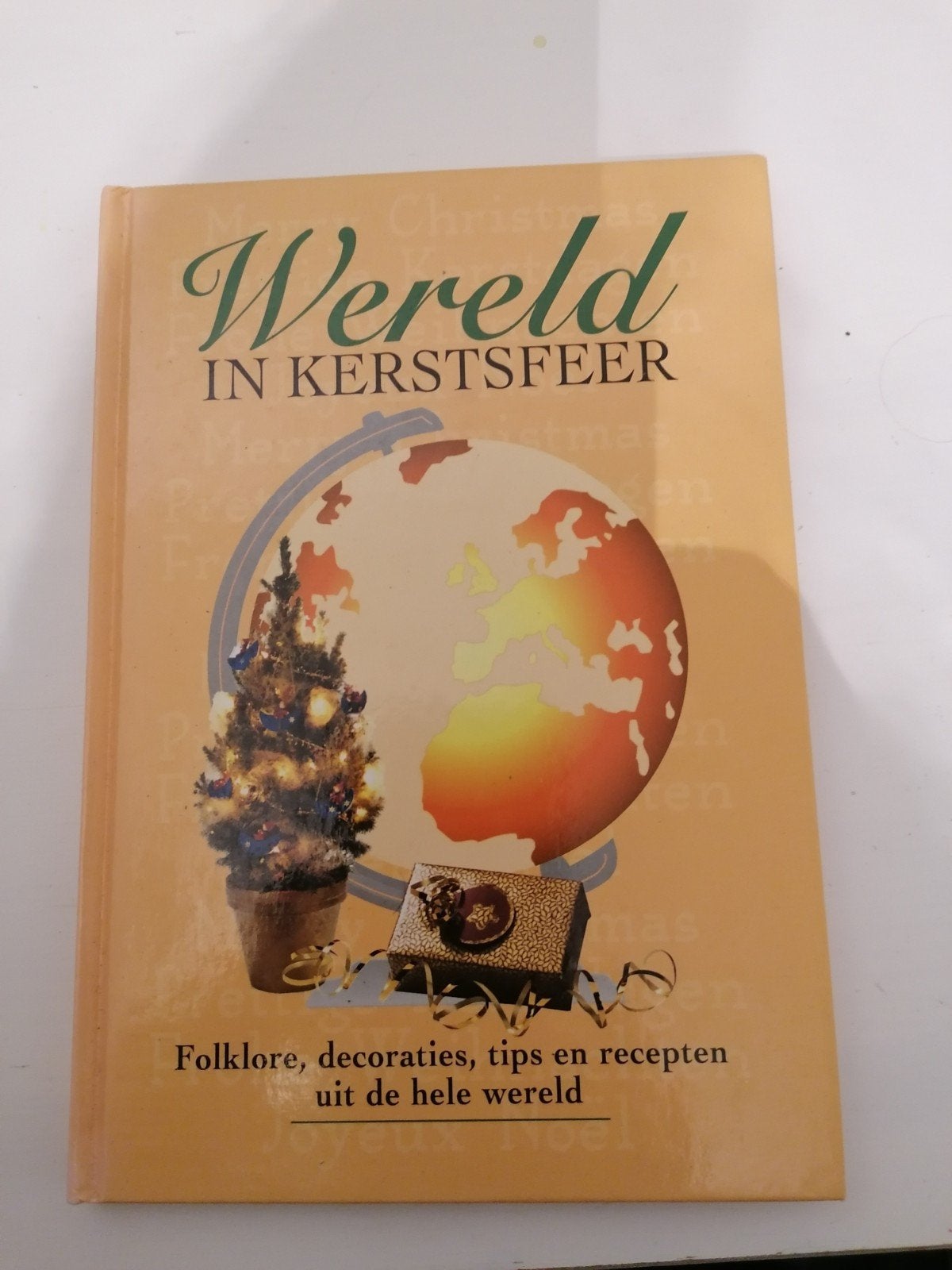 Wereld in Kerstsfeer: Folklore, Decoraties, Tips & Recepten, Boeken, Ophalen of Verzenden, Gelezen, Sonja van de Rhoer