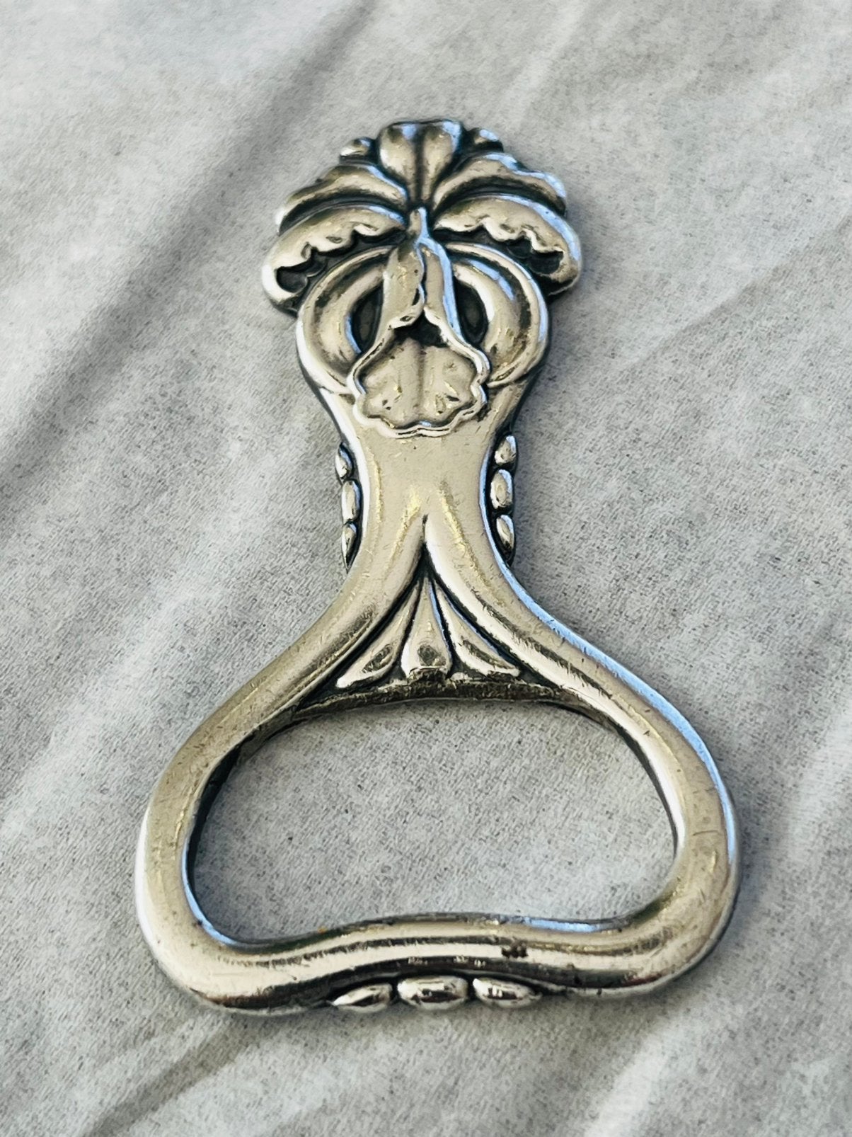 Gero 640 Orchidee flesopener verzilverd gero 90 uit 1922, Verzenden