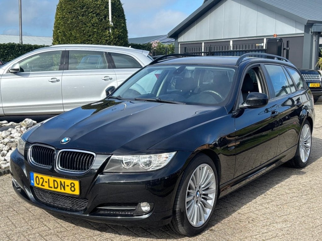 BMW 3 Serie Touring 318I Zwart 2010 Facelift NL Auto Sportve, Stof, Zwart, Zwart, Origineel Nederlands