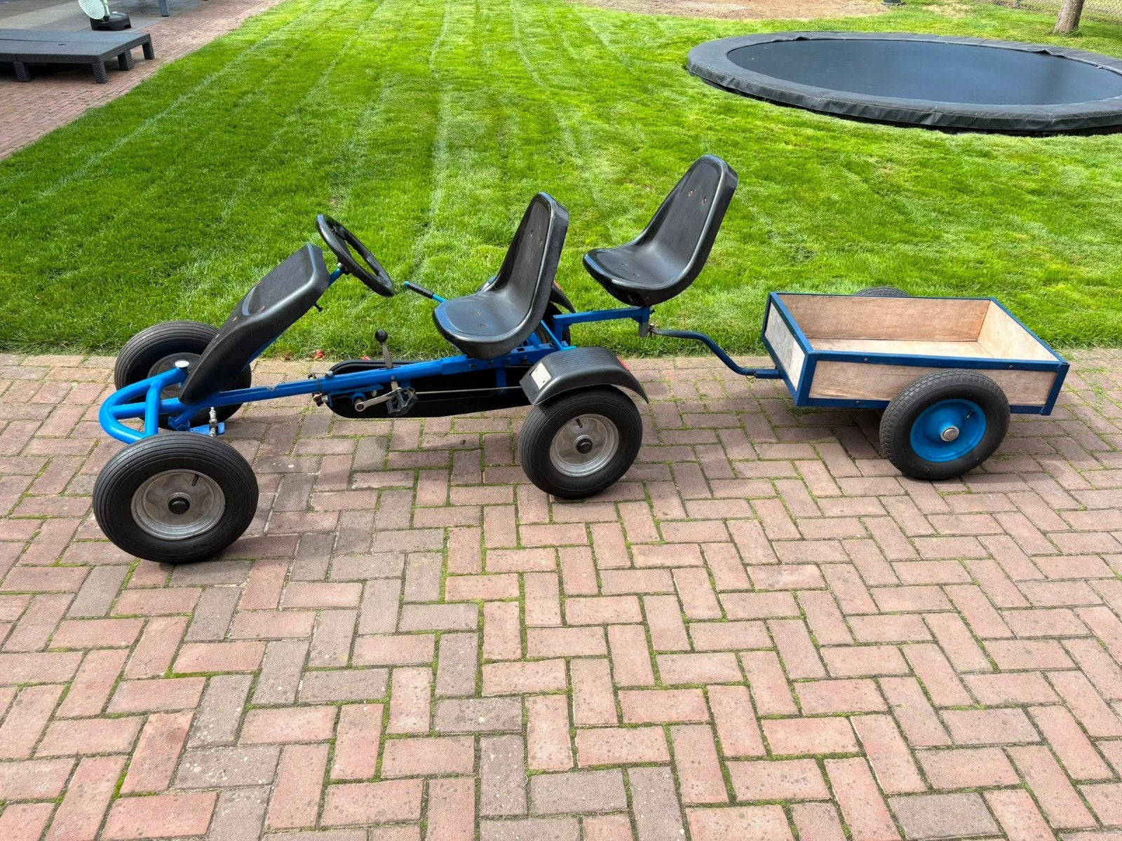 Blauwe skelter met duozit en kiep aanhanger, Ophalen, Gebruikt, Overige merken, Duozit