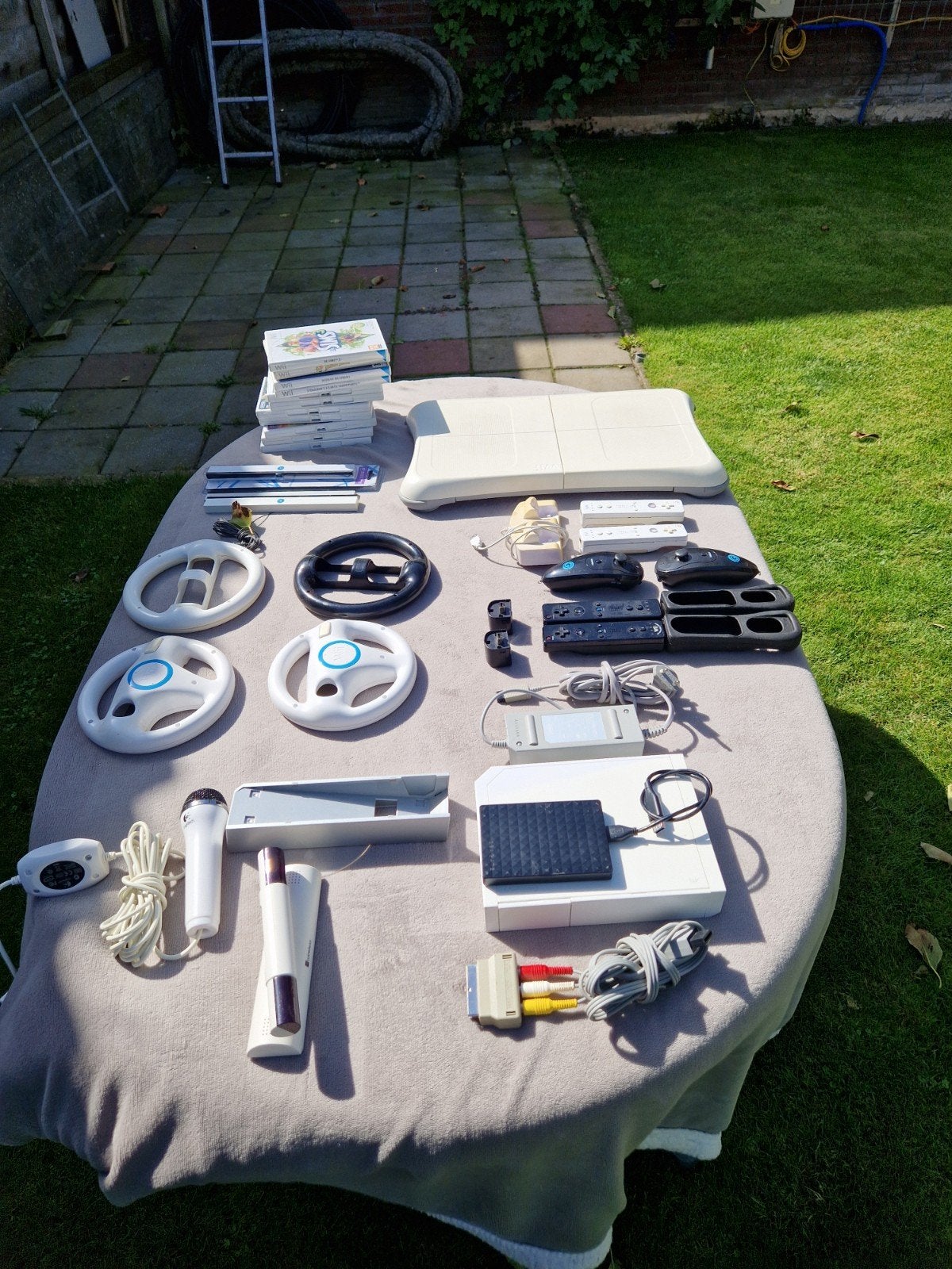 Complete Nintendo Wii-bundel met accessoires en games, Ophalen of Verzenden, Gebruikt, Met 3 controllers of meer, Met stuurtje