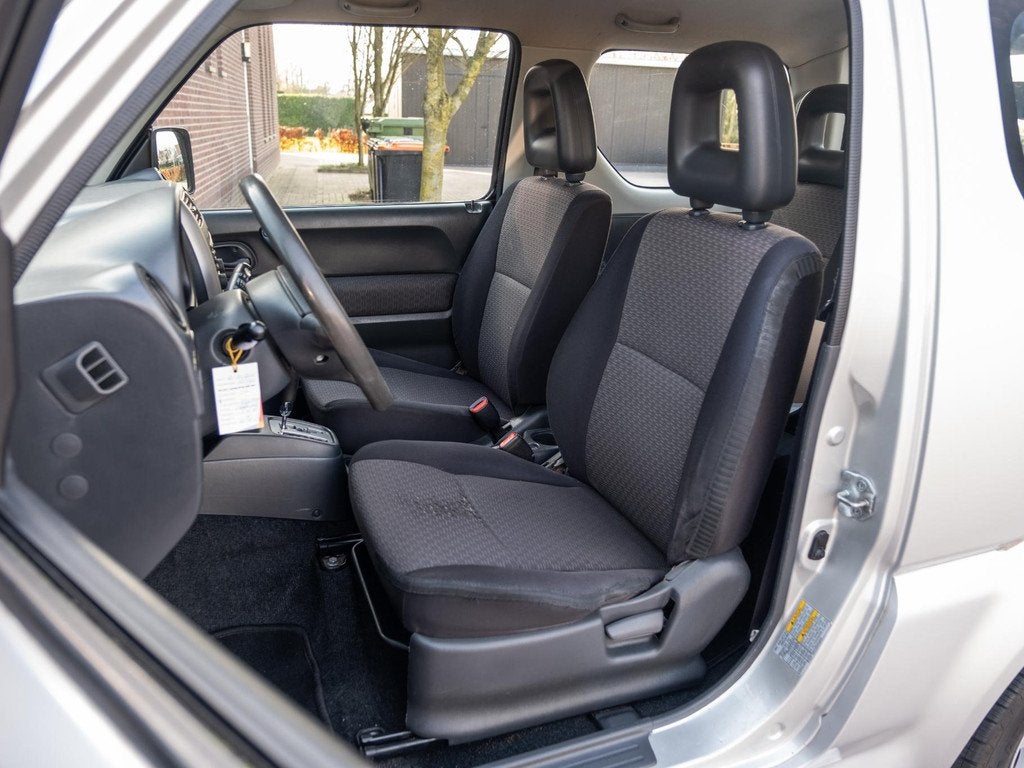 Suzuki Jimny 1.3 Exclusive | 1 eig! | Airco | Afn Trekhaak |, Auto's, Euro 5, Zwart, 4 stoelen, Origineel Nederlands
