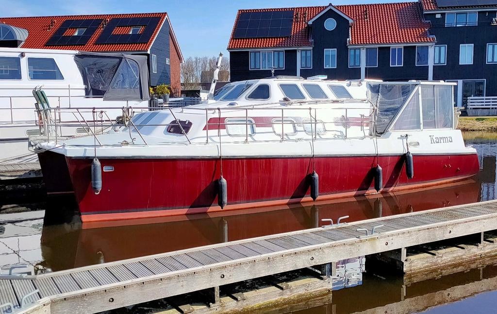 Uniek Motorjacht catamaran, ca 10x5 meter. 2 diesel motoren, Ophalen of Verzenden