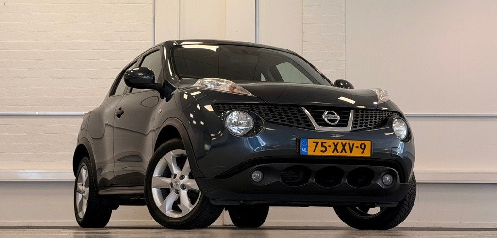 Nissan Juke 1.6i 16v Acenta Automaat Garantie Mooi!, Auto's, Nissan, Euro 5, Stof, Zwart, 4 cilinders