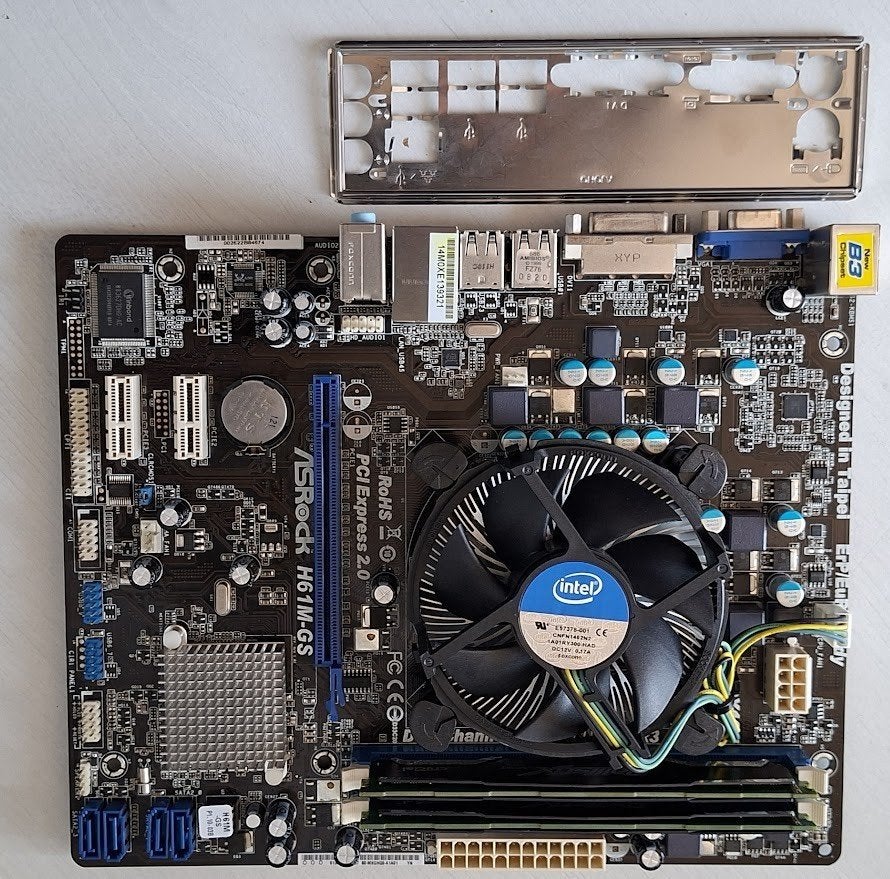 Asrock H61M-GS met een I7-2600 en 8 Gb geheugen, Ophalen, Gebruikt, DDR3, Micro-ATX