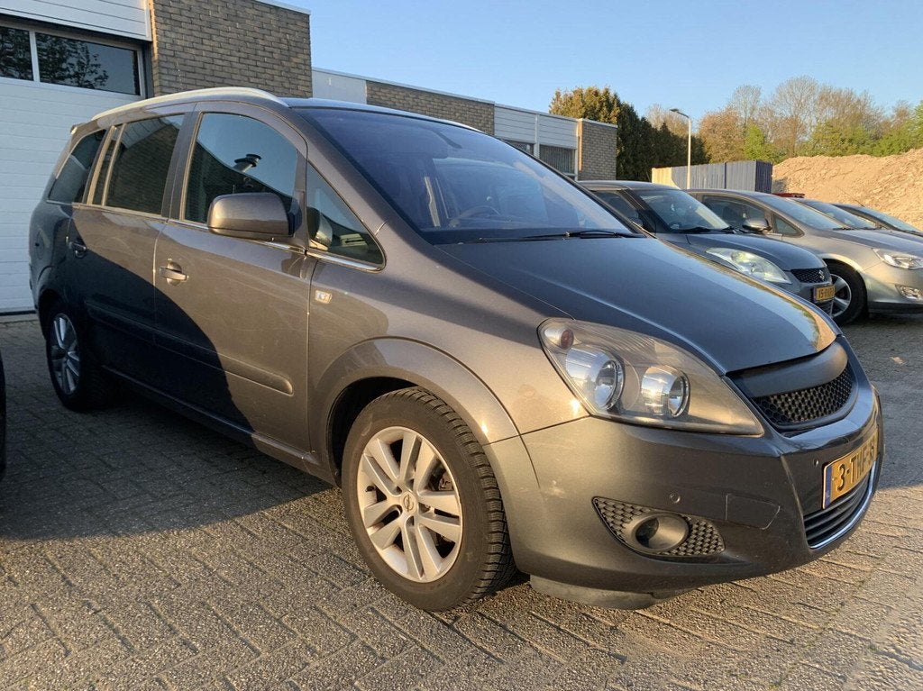 Opel Zafira 1.8 Cosmo OPC-line 7P Airco Navi Trekhaak Cruise, Auto's, Stof, Gebruikt, 4 cilinders, 1403 kg