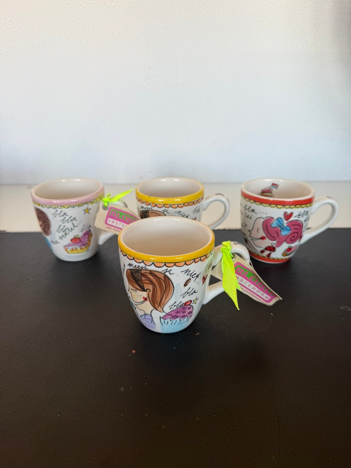 4 mokken blond Amsterdam, Ophalen of Verzenden, Zo goed als nieuw, Overige stijlen, Kop(pen) en/of Schotel(s)
