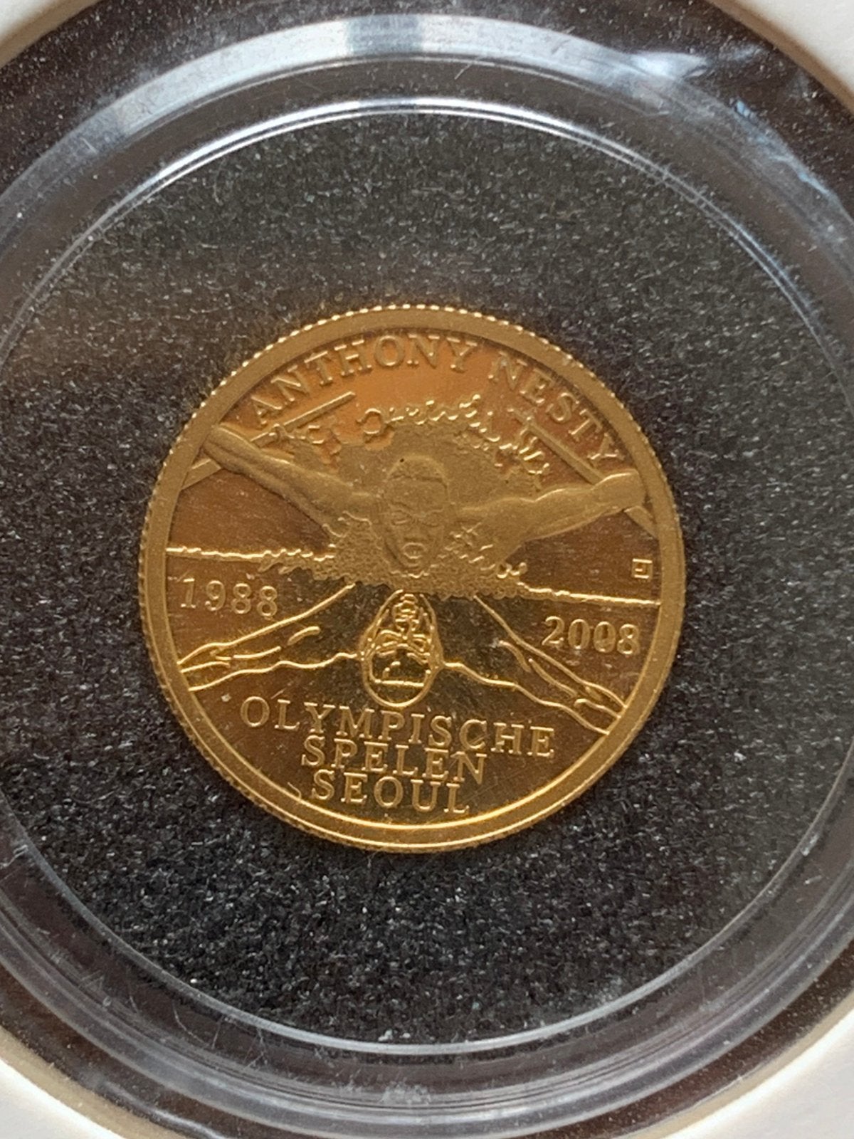 Suriname gouden munt Anthony Nesty 1988 goud, Ophalen of Verzenden, Losse munt, Goud