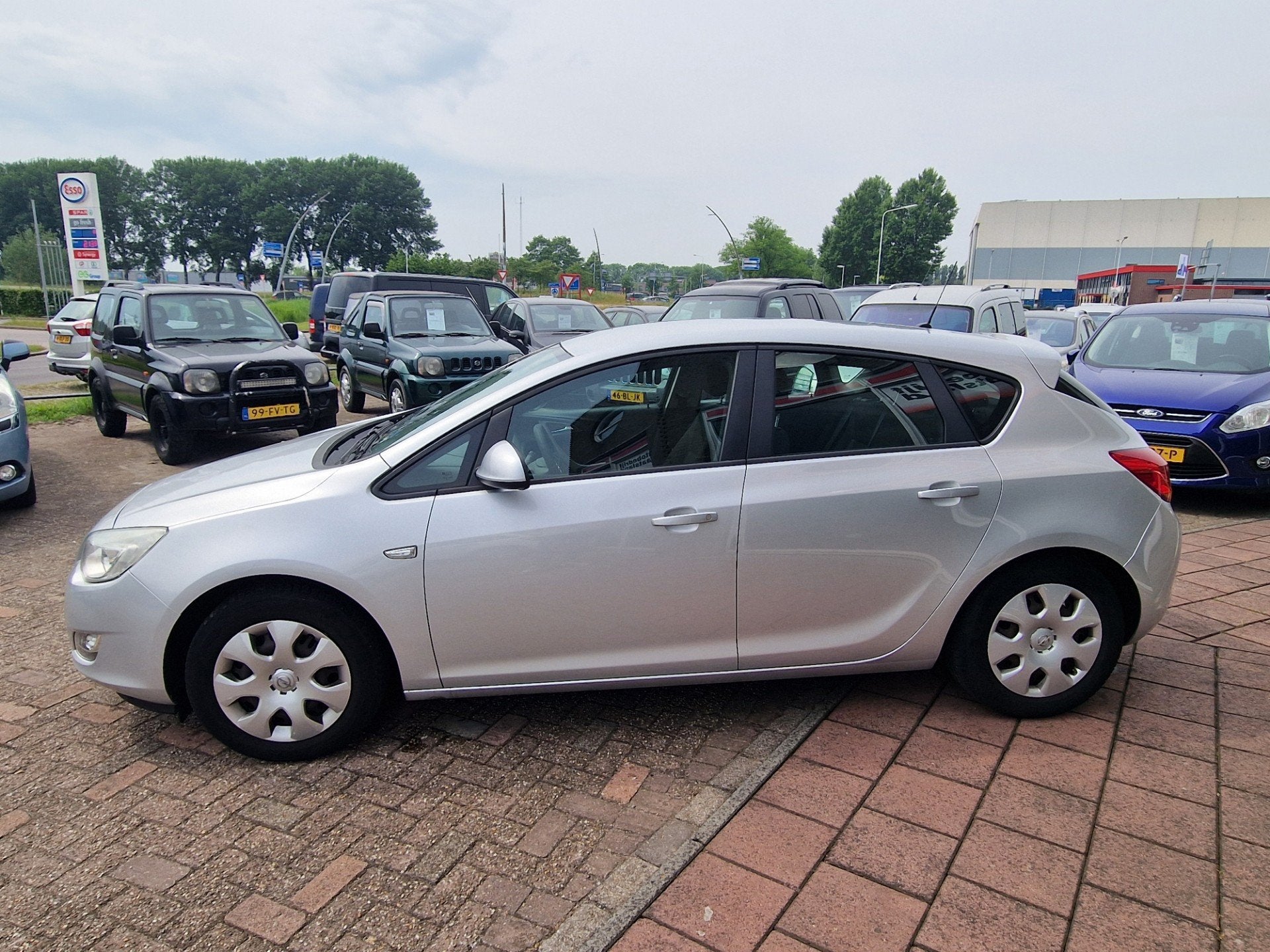 Opel Astra 1.6 Edition - Clima - Cruise -, Auto's, Voorwielaandrijving, Euro 5, Stof, 4 cilinders