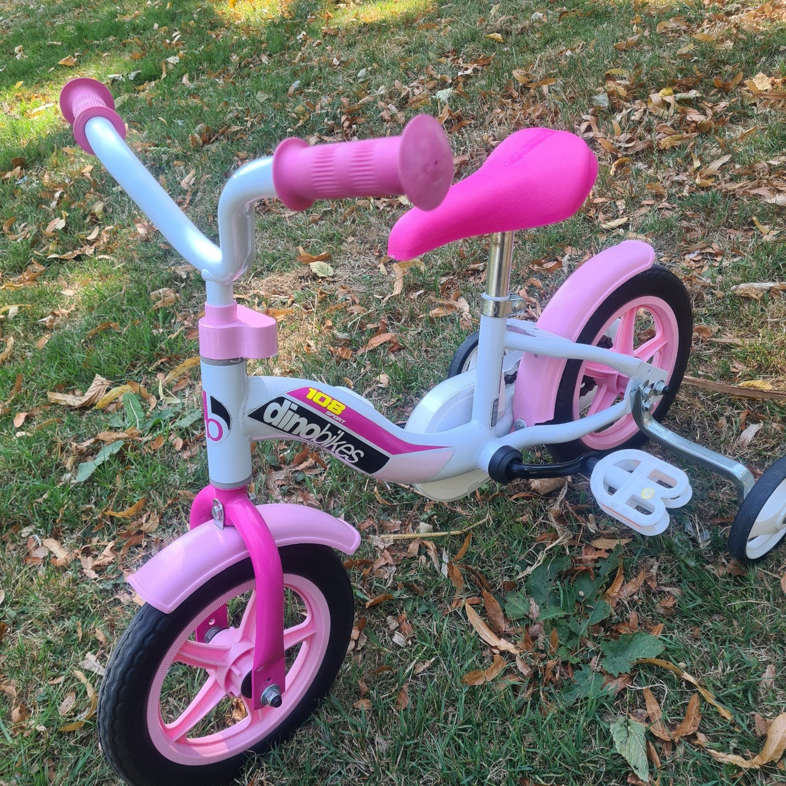 Dino Bikes Kinderfiets 10 inch roze met zijwieltjes, Fietsen en Brommers, Fietsen | Kinderfietsjes, Terugtraprem, Zijwieltjes