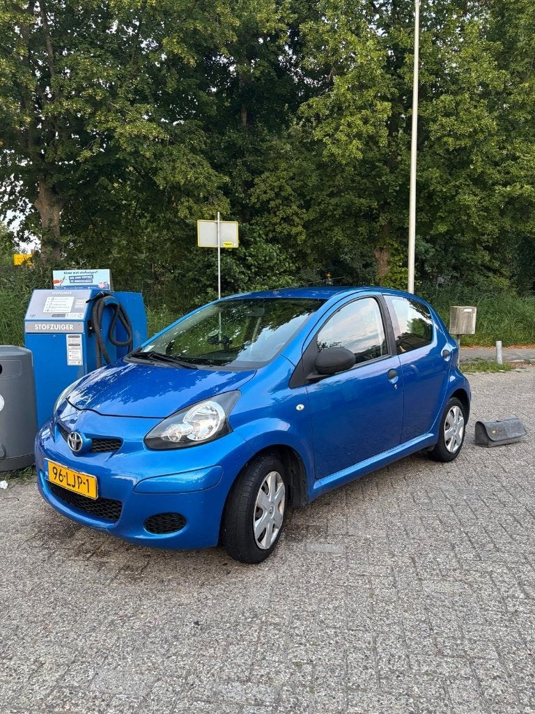 Toyota Aygo 1.0 12V Vvt-i 5DRS 2010 Blauw, Auto's, Toyota, Voorwielaandrijving, Stof, 68 pk, Origineel Nederlands