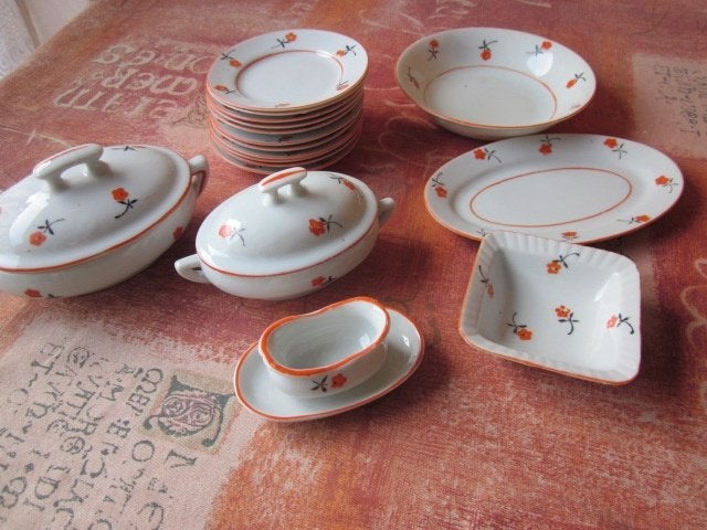 Vintage kinderserviesje met oranje bloemmotief - 19-delig, Ophalen of Verzenden