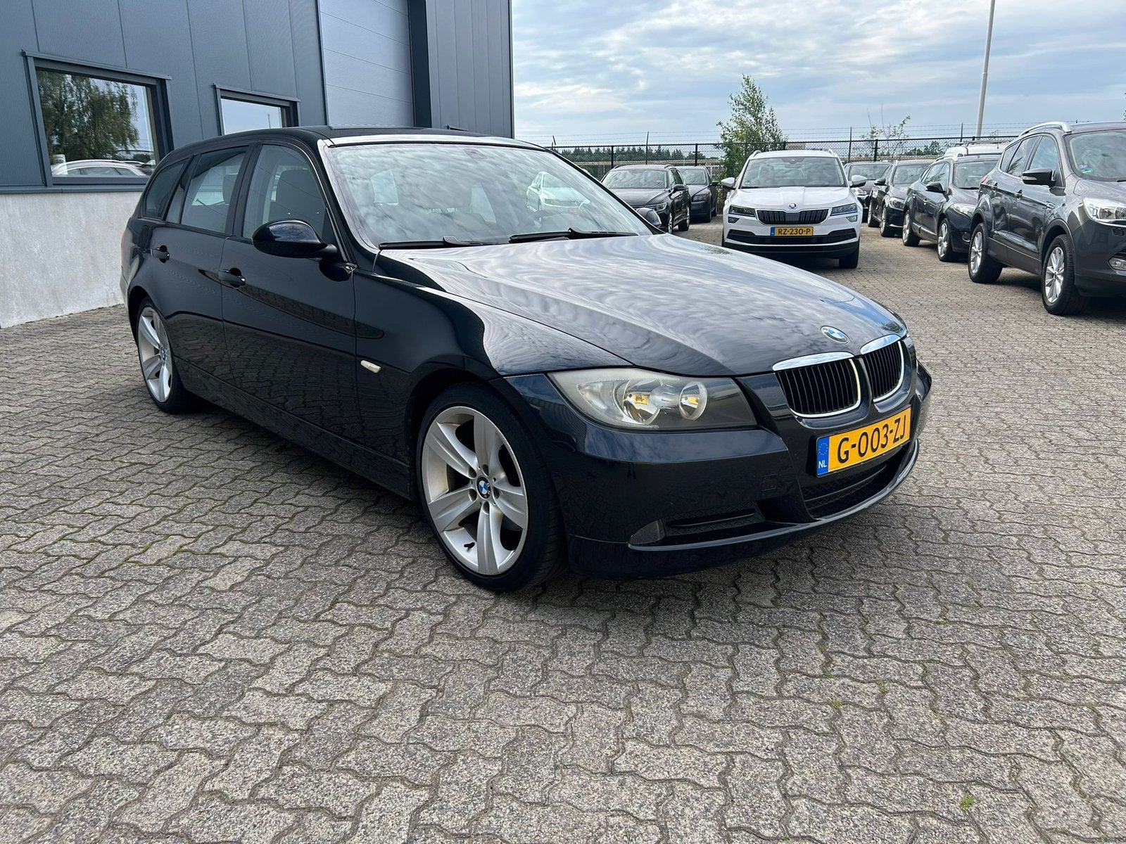 BMW 3-Serie 2.0 I 320 Touring 125KW 2008 Zwart, Auto's, BMW, 1995 cc, Zwart, 4 cilinders, Zwart