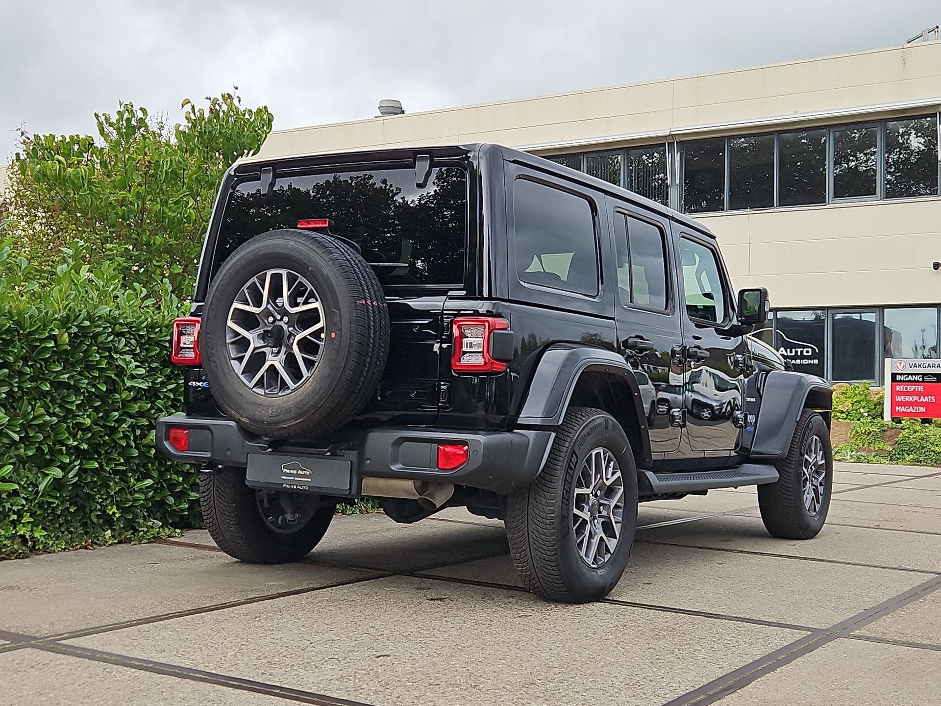Jeep Wrangler Unlimited 4xe 380 Sahara |NAVI|CLIMA|CRUISE|CA, Adaptive Cruise Control, Zwart, 4 cilinders, Cabriolet