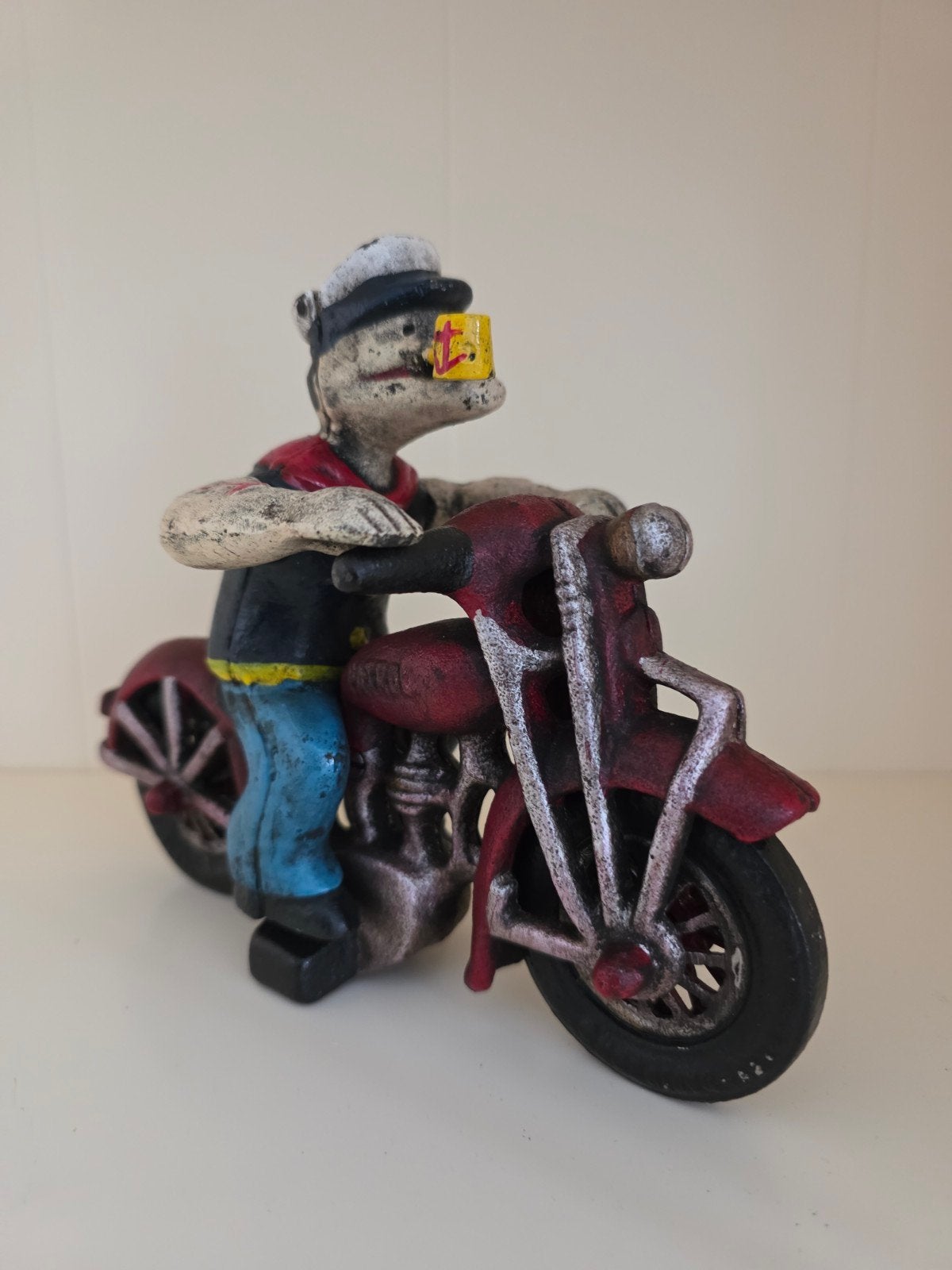 Vintage Popeye op motorfiets beeldje - gietijzer, Ophalen of Verzenden, Gebruikt, Overige typen