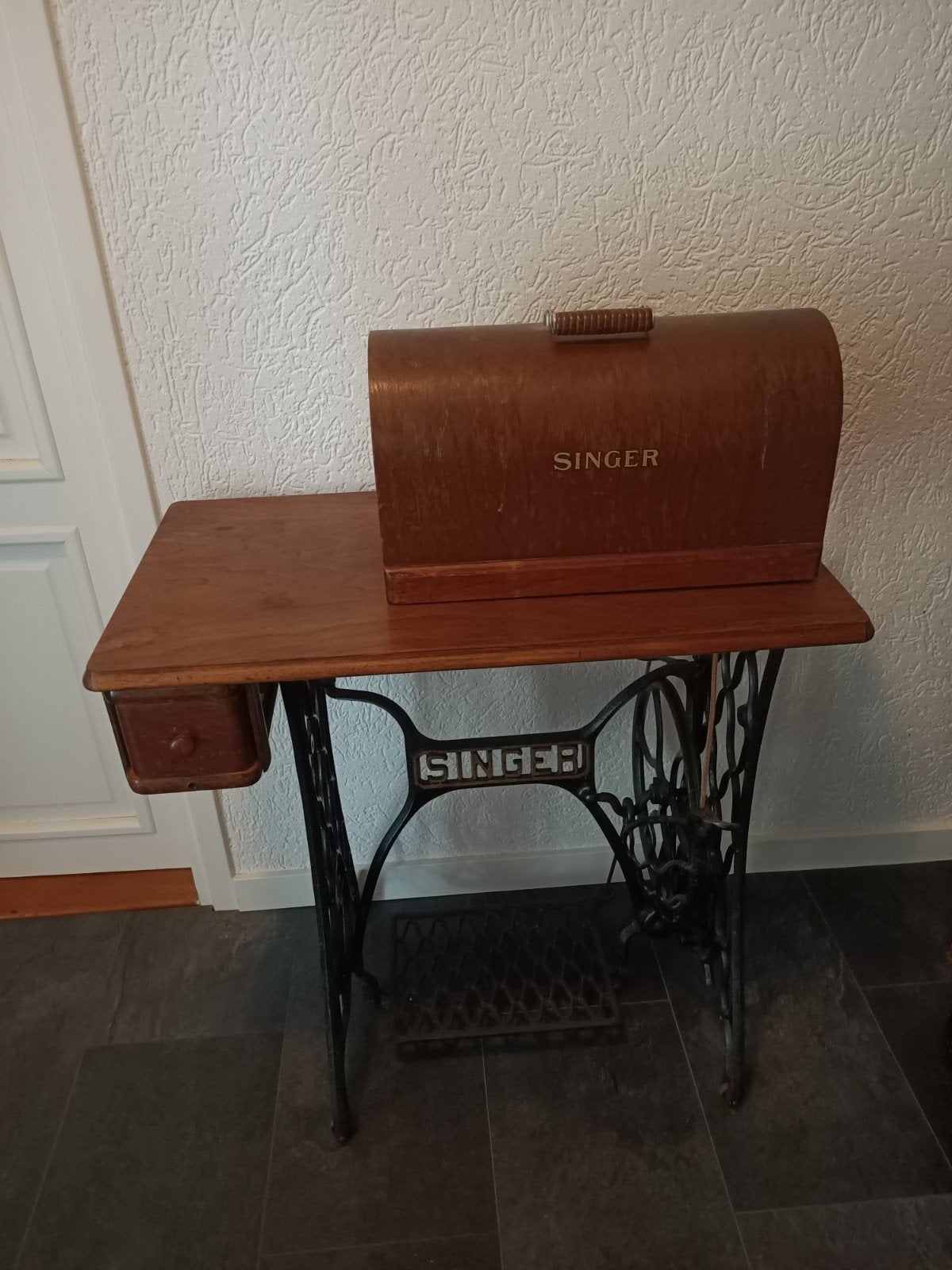 Singer naaimachine, Ophalen