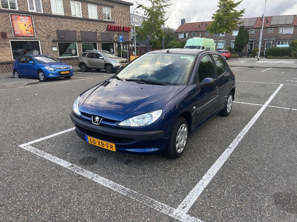Peugeot 206 1.4 5D 2007 Blauw, Auto's, Voorwielaandrijving, 31 €/maand, 4 cilinders, Blauw