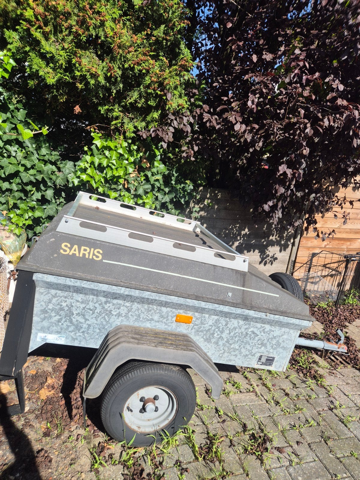 Saris aanhangwagen met deksel, Ophalen, Gebruikt
