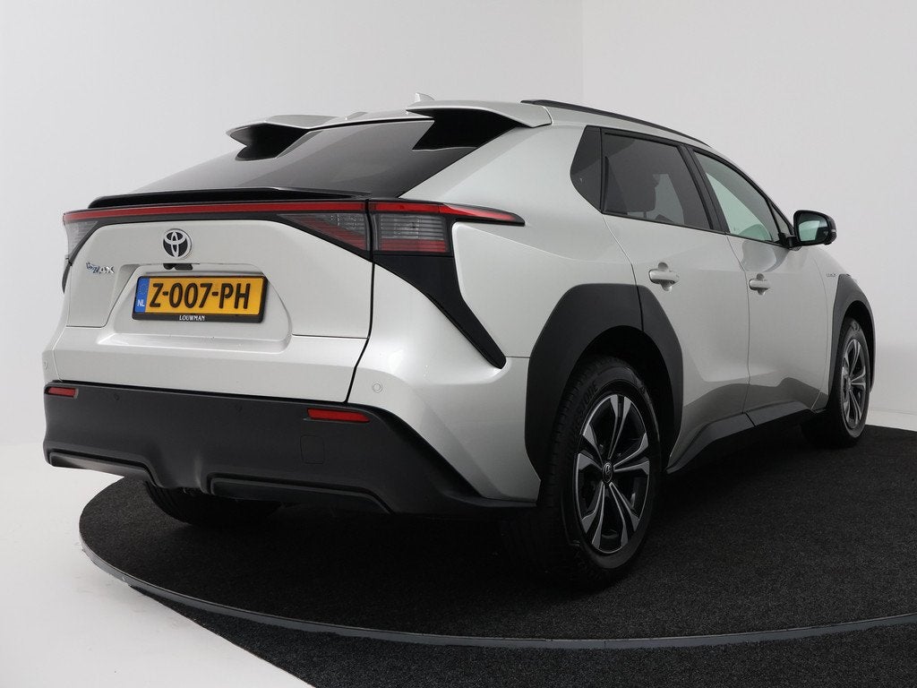 Toyota Bz4x Dynamic 71 kWh | Navigatie | Trekhaak | PDC | BL, Auto's, Toyota, 12 maanden, Stof, Gebruikt, 71 kWh