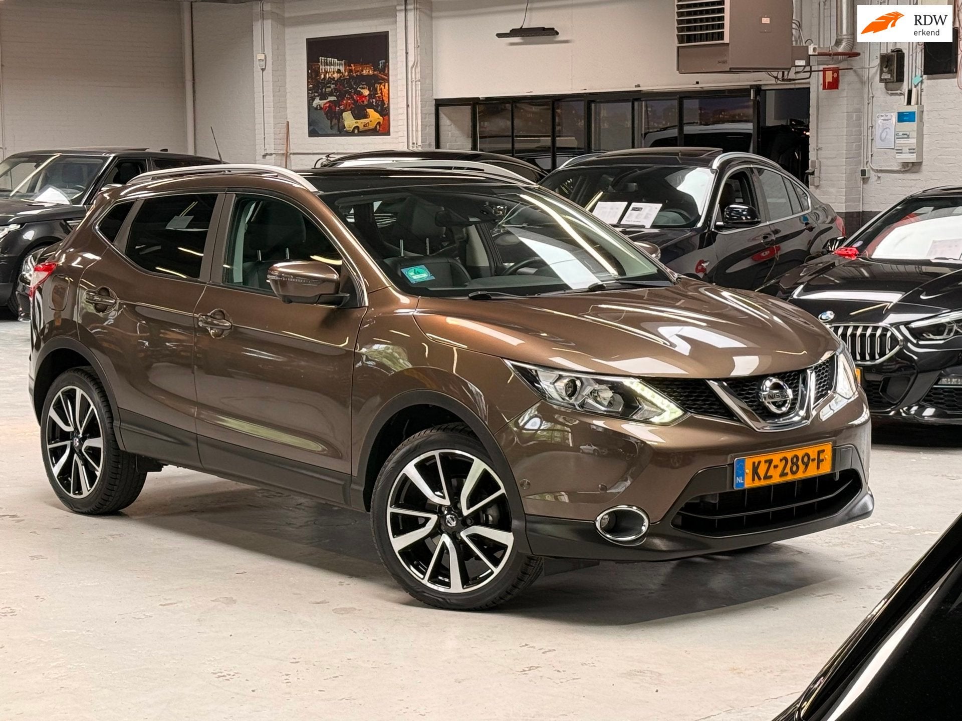 Nissan Qashqai 1.2 Tekna Panorama Leder Navigatie Cruise con, Auto's, Nissan, Voorwielaandrijving, Gebruikt, 4 cilinders, Bruin
